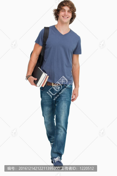 學生用背包和書走路的正面視圖
