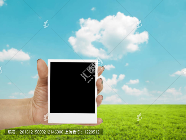 背景背景的手持空白照片