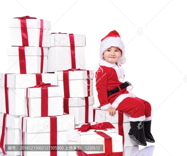 圣誕老人在圣誕老人克勞斯服裝坐在禮品盒