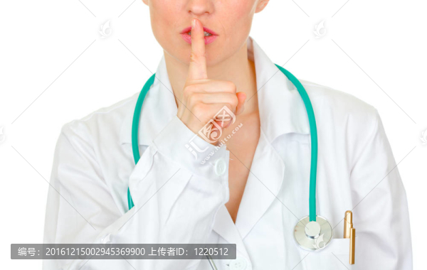 用手指在白色上孤立的口腔醫(yī)生。噓的手勢