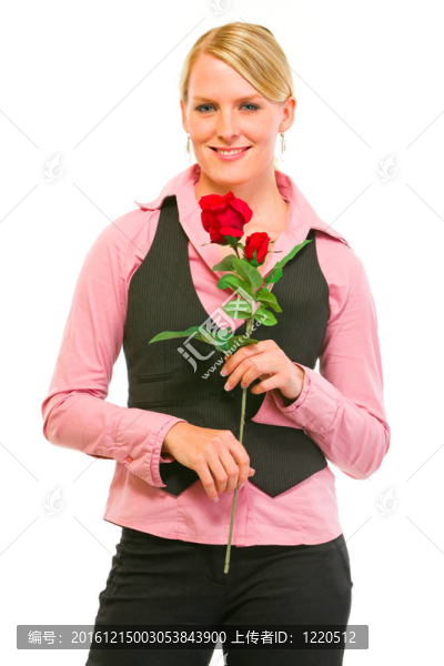 微笑的現(xiàn)代商業(yè)女性手持紅玫瑰