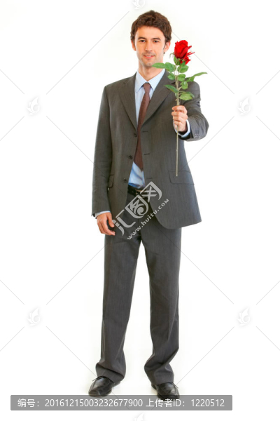 現(xiàn)代商人的肖像與紅玫瑰手在白色隔離