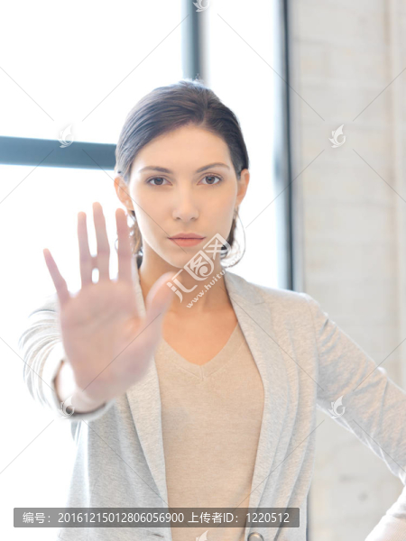 女人做停止手勢