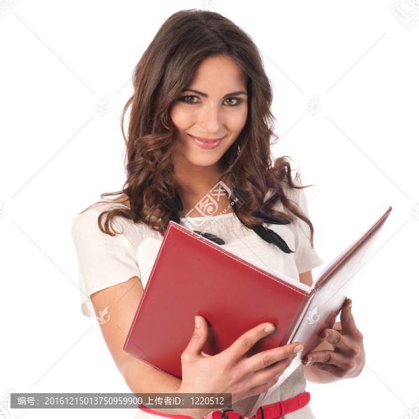 年輕可愛的女商人手里拿著一本書
