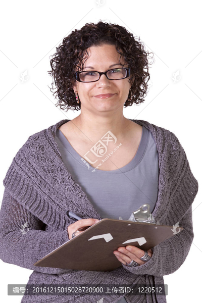美麗的西班牙裔婦女與剪貼板