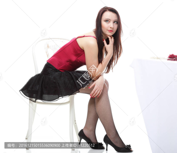 在紅色的緊身衣椅白孤立女人跳舞女郎
