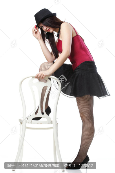 在紅色的緊身衣椅白孤立女人跳舞女郎