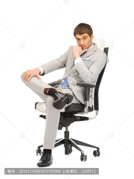坐在椅子上的年輕商人