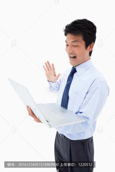 一個商人在筆記本上揮舞的肖像