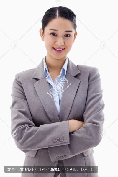 一個微笑的女商人肖像擺臂