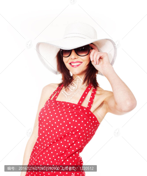 帶帽子和太陽(yáng)鏡的漂亮女性