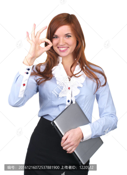 漂亮的女商人顯示OK的手勢