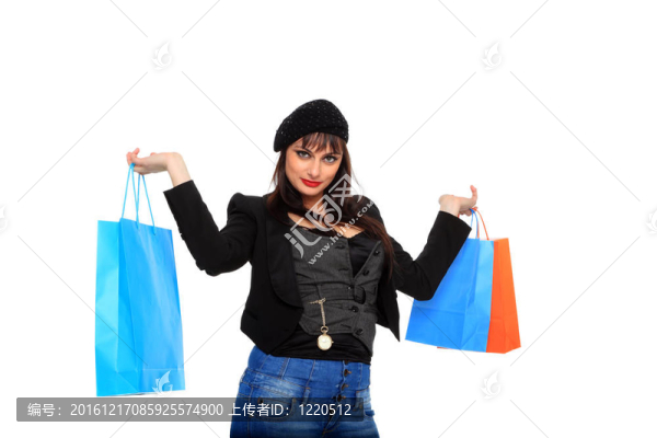 驚人的年輕女子攜帶購物袋