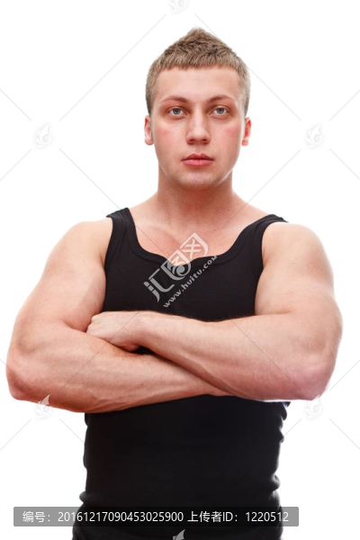 一個英俊的白人男子在黑色T恤musculan雙手對乳腺孤立在白色背景