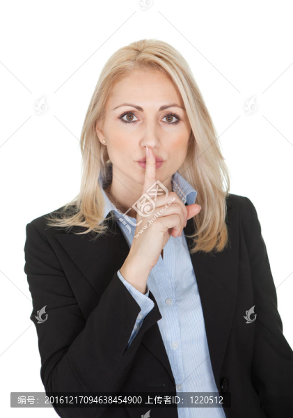 美麗的商業(yè)女性做了一個(gè)沉默的手勢(shì)