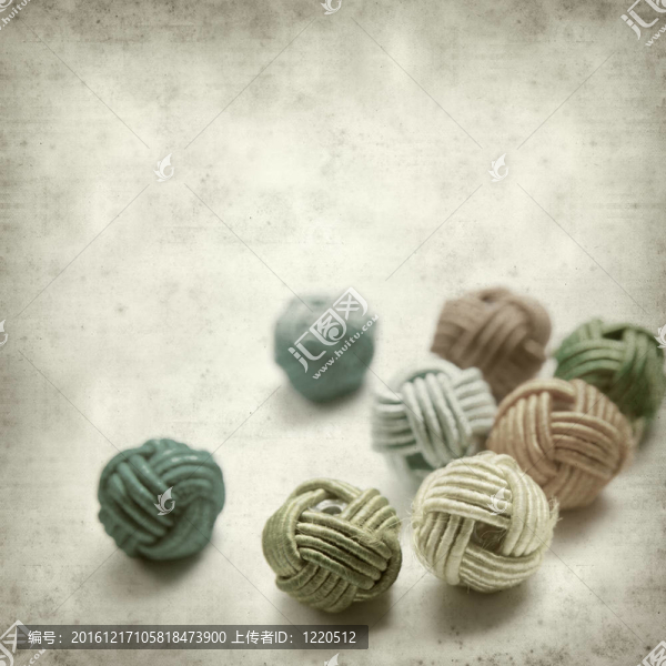 紋理的舊紙的背景與風格的珠子打結
