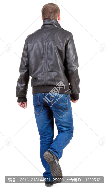 穿夾克的英俊男人的背影。走路的年輕人