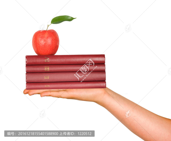 書與蘋果在手作為教育的禮物