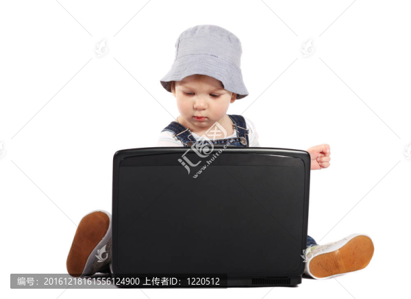 帶筆記本電腦的小男孩