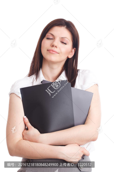 漂亮的女商人與文件夾在手