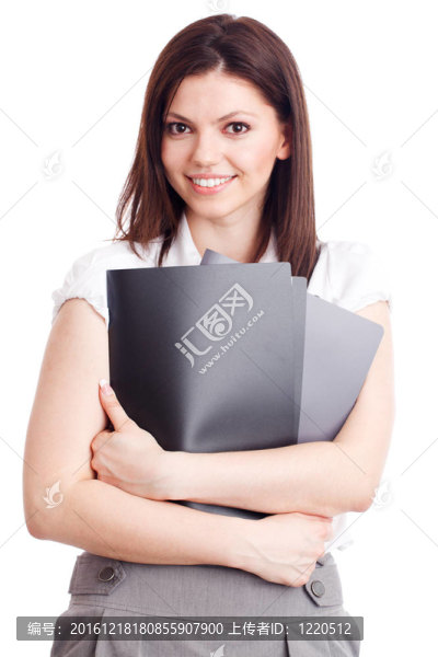 漂亮的女商人與文件夾在手
