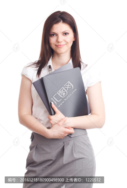 漂亮的女商人與文件夾在手