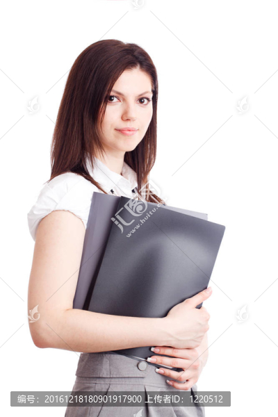 漂亮的女商人與文件夾在手