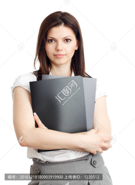 漂亮的女商人與文件夾在手