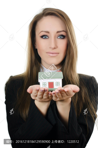 商業(yè)婦女與小模型的房子