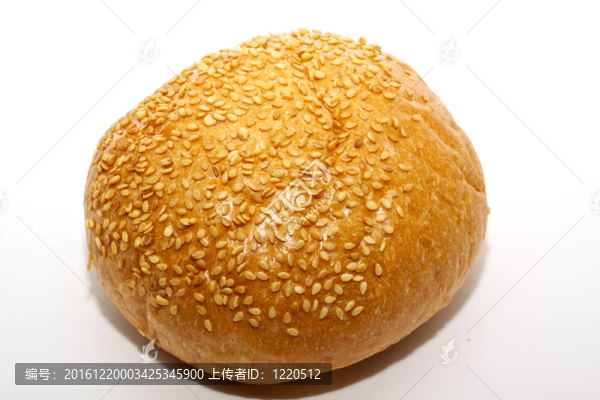 一塊面包和白色的面包卷