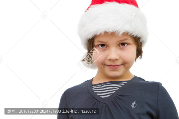 小女孩打扮得像圣誕老人
