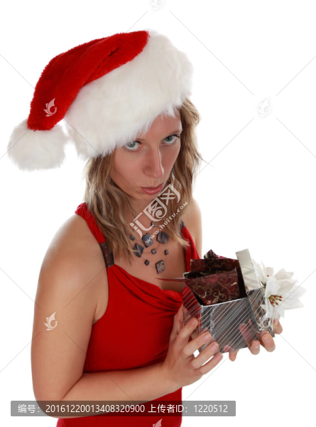 可愛的女孩拿著圣誕禮物