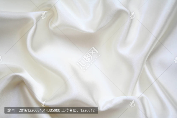 光滑優(yōu)雅的白色絲綢為背景