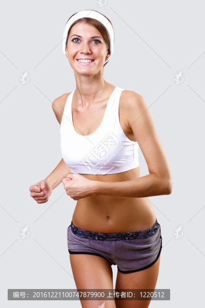穿運(yùn)動(dòng)服的年輕漂亮女人