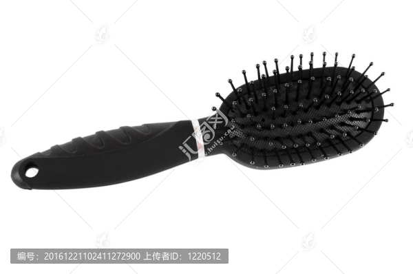 黑色的按摩梳子，孤立在白色背景