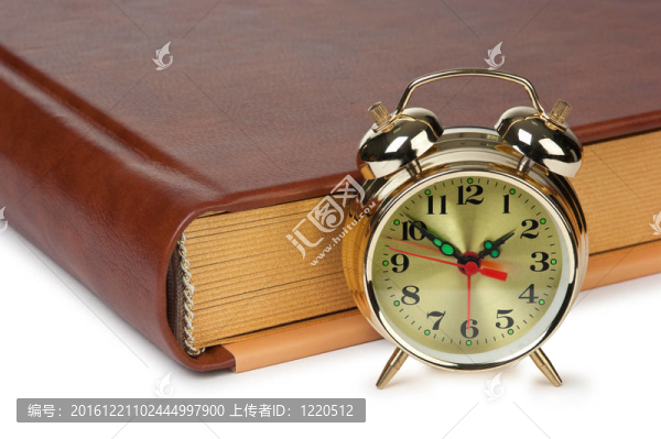 金鬧鐘上的書孤立