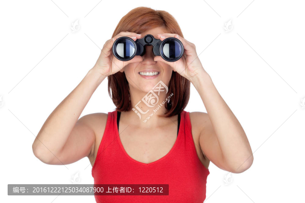 美麗的紅發(fā)女孩透過望遠鏡