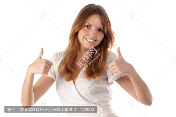 豎起大拇指。微笑的年輕女性