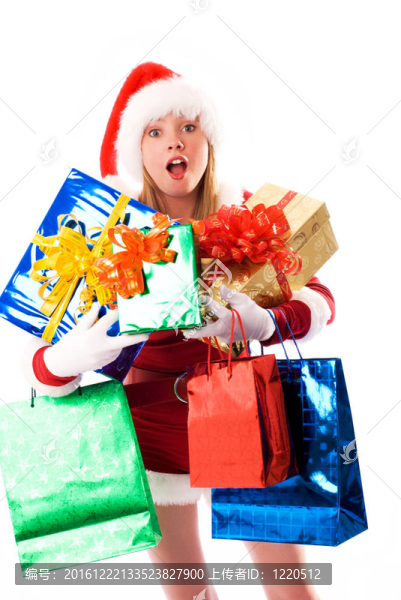 女孩打扮成Santa與禮物