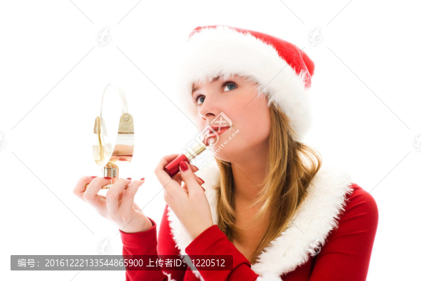 女孩打扮成Santa畫她的嘴唇