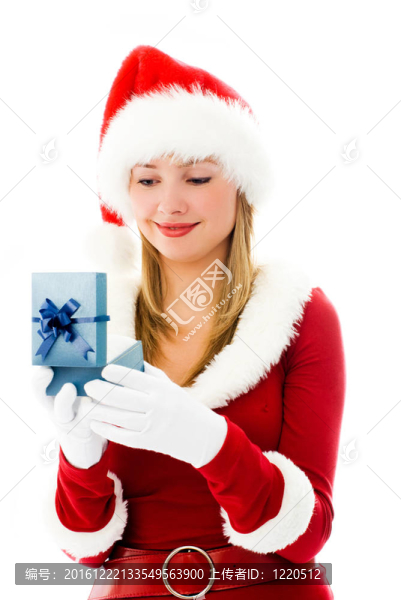 打扮漂亮的女孩Santa打開圣誕禮物