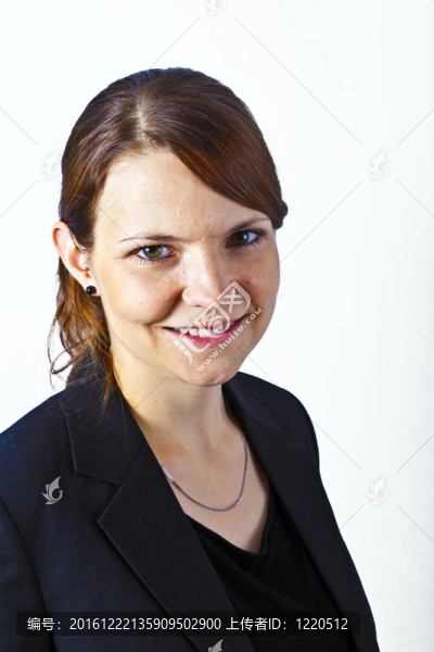 商業(yè)婦女面帶微笑和期待嚴(yán)重