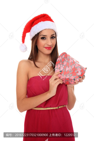 抱著盒子的圣誕老人女孩
