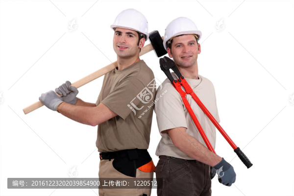 建筑工人持有重型工具