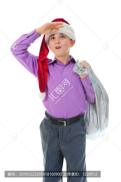 快樂的男孩在圣誕老人帽子