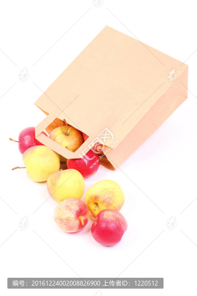 購物棕色禮品袋和蘋果隔離