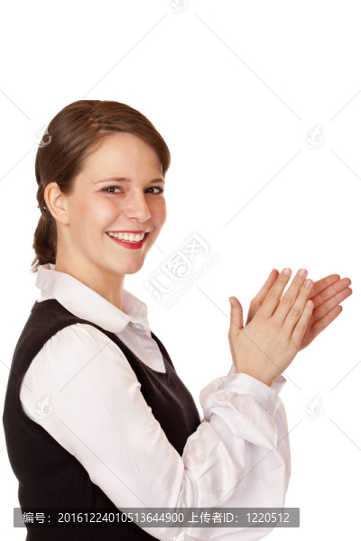 迷人的笑的女商人拍拍手