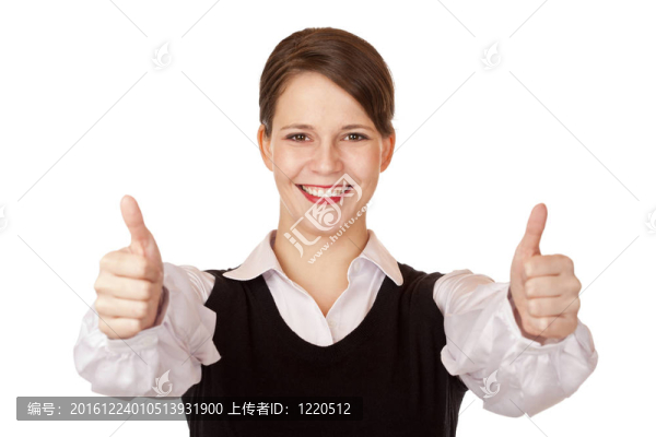 休閑的年輕漂亮的女商人顯示豎起大拇指