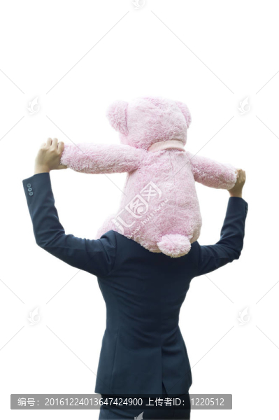 肖像商業(yè)婦女與熊娃娃；孤立