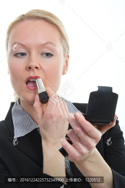 迷人的金發(fā)女人穿著西裝